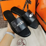 Hermès Burgundy Flat Thong Sandals - Close-Up Texture View