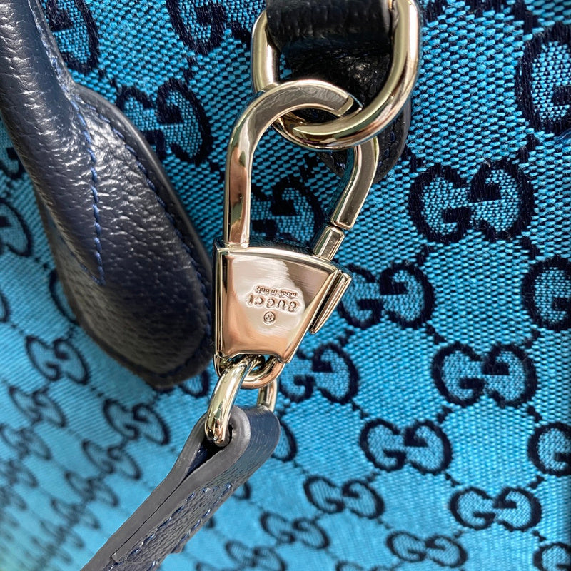 Handle and strap detail of sleek everyday-luxe women's handbag – women's luxury accessory