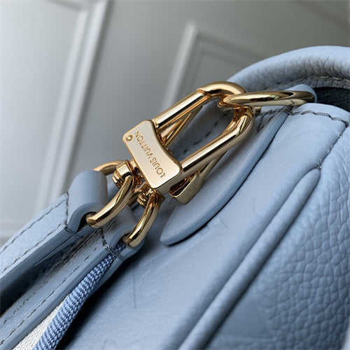  signature top-handle bag styled with outfit