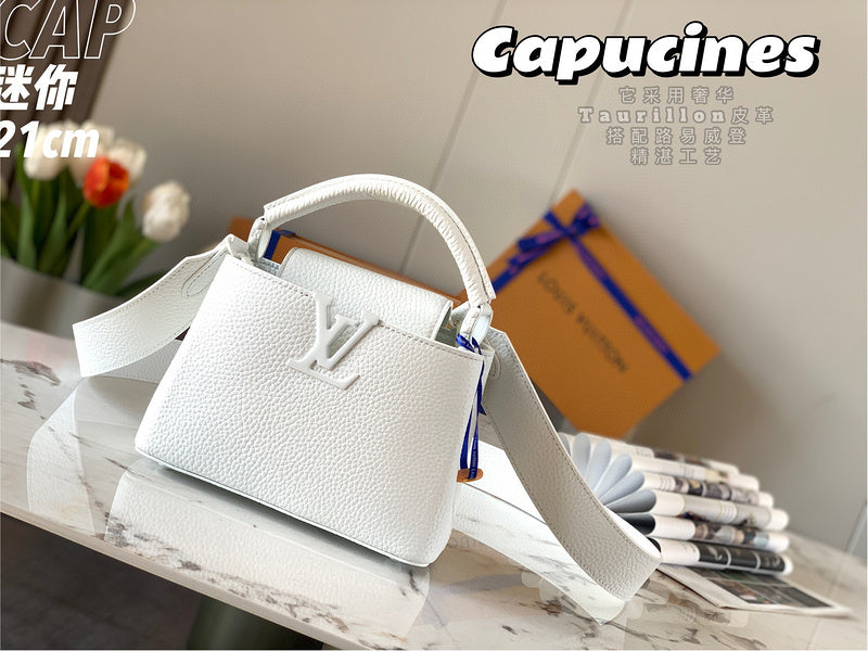 Side profile of classic chic women's handbag – women's statement bag