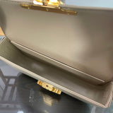 Handle and strap detail of classic refined women's handbag – women's luxury accessory