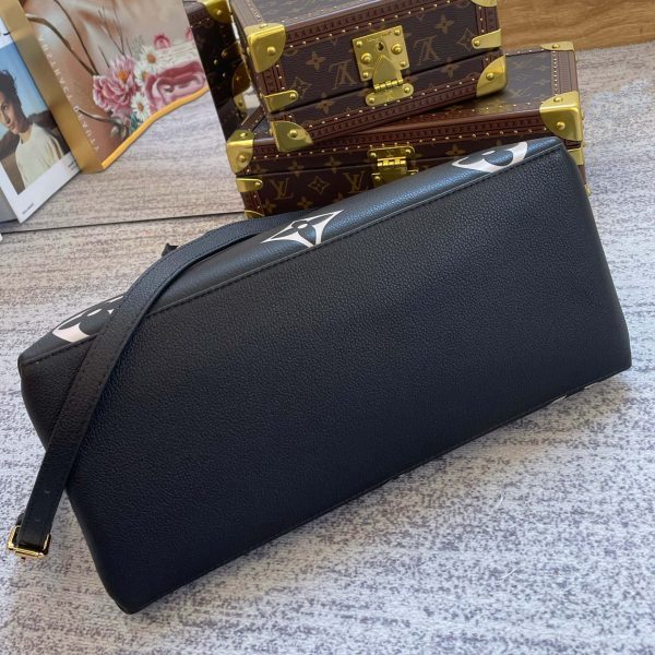 Styled lifestyle shot of chic signature women's handbag – women's premium purse