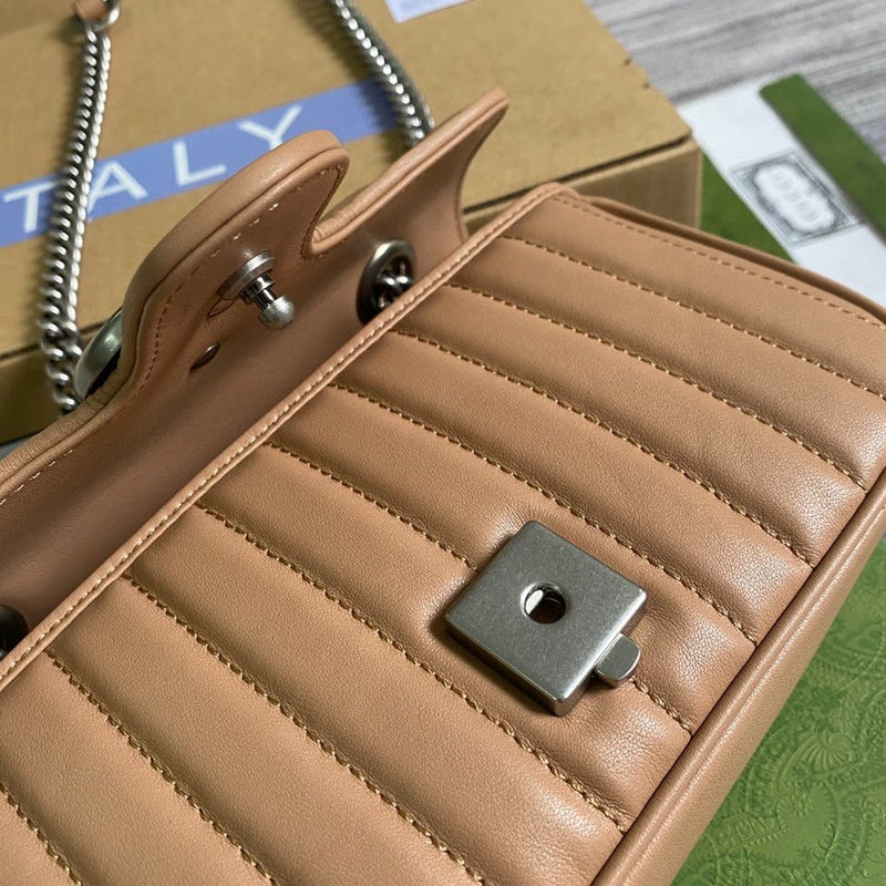 Side profile of elevated polished women's handbag – women's designer-style accessory