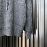 Front view of Louis Vuitton luxury clothing with everyday silhouette