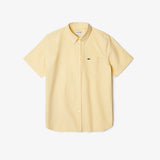 Side profile of Lacoste luxury clothing with logo-detail design