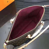 Side profile of polished refined women's handbag – women's statement bag