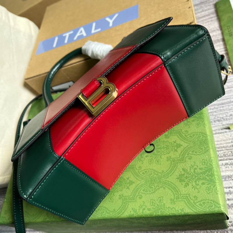 Styled lifestyle shot of signature refined women's handbag – women's luxury accessory