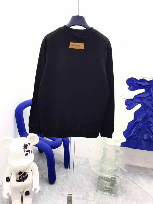 Back view of Louis Vuitton luxury clothing with runway-inspired design