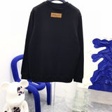 Back view of Louis Vuitton luxury clothing with runway-inspired design