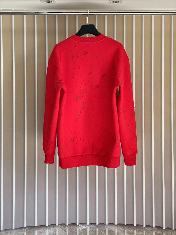 Side profile of Givenchy luxury clothing with logo-detail design