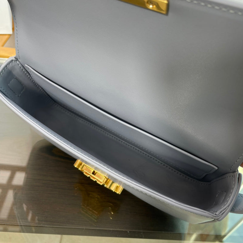 Back view of polished refined women's handbag – women's luxury handbag