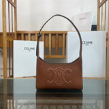 Front view of sleek refined women's handbag – women's luxury handbag