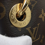 Handle and strap detail of modern statement women's handbag – women's luxury accessory