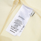 Close-up detail shot of Gucci luxury clothing with tailored silhouette