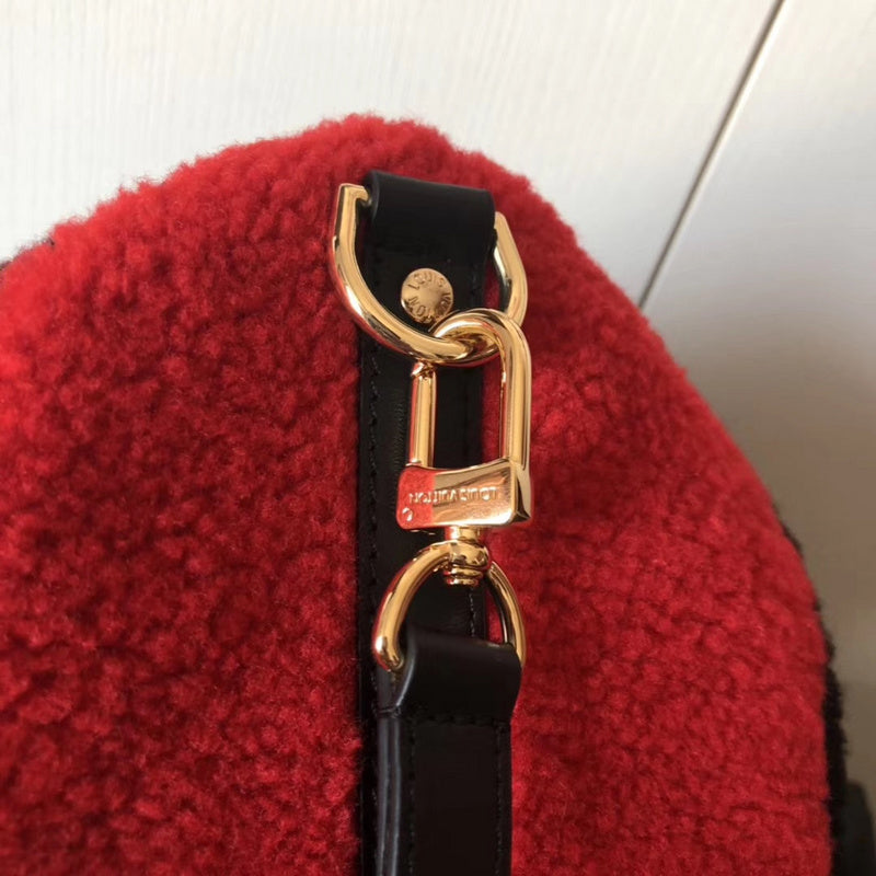 Handle and strap detail of classic polished women's handbag – women's premium purse