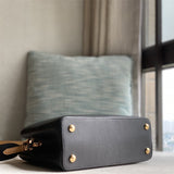  top-handle bag close-up of hardware and finish