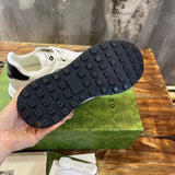 Gucci sneakers detailed view showing premium designer craftsmanship