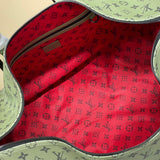  Signature shoulder bag carried on shoulder