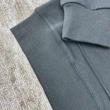 Three-quarter angle view of Amiri luxury piece style No.077