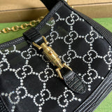 Back view of sleek refined women's handbag – women's luxury handbag