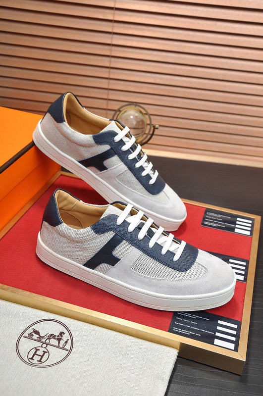 Hermès Beige High-Top Sneakers - Angled View