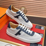 Hermès Beige High-Top Sneakers - Angled View