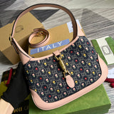 Handle and strap detail of everyday-luxe modern women's handbag – women's luxury accessory