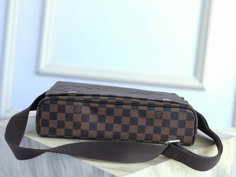 Styled lifestyle shot of classic refined women's handbag – women's luxury handbag