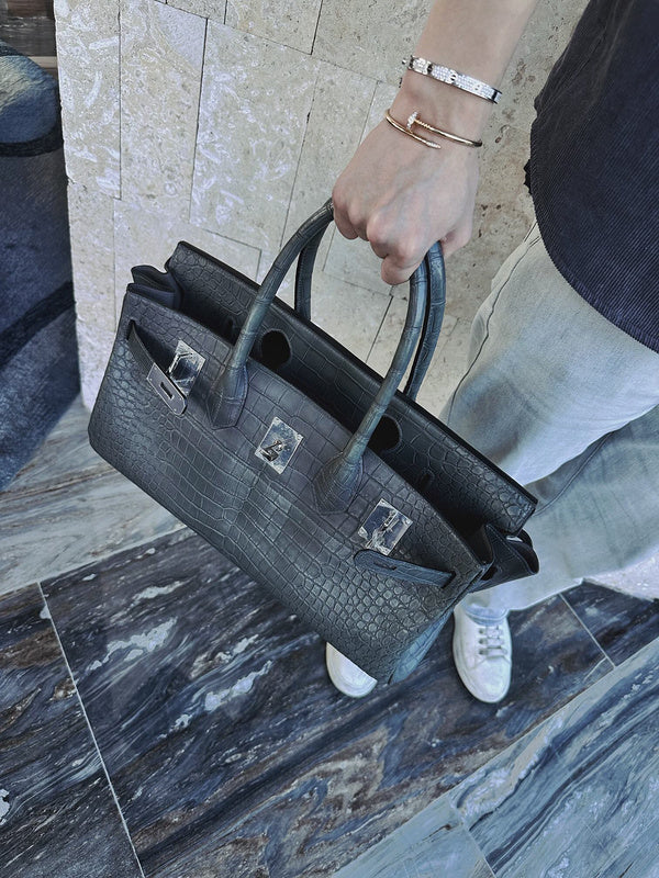 Close-up detail of polished bag design