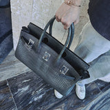 Close-up detail of polished bag design
