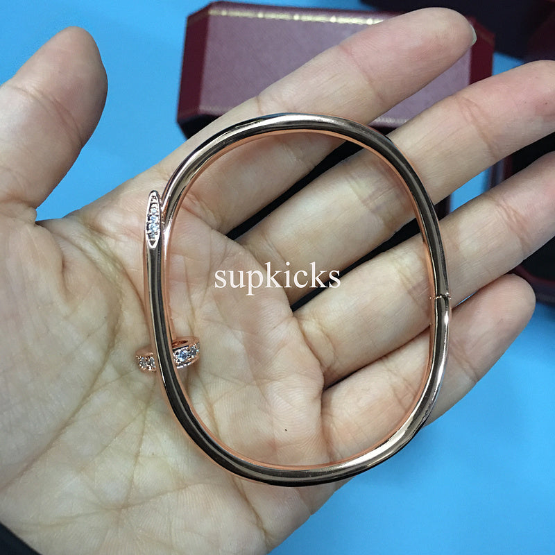 Angled view of Cartier unisex jewelry piece