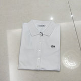 Close-up detail shot of Lacoste luxury clothing with tailored silhouette