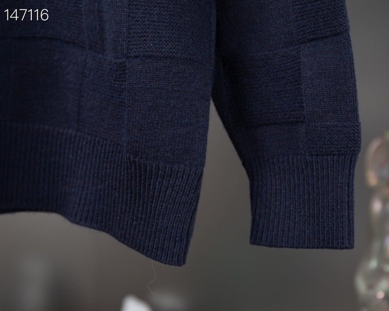 Flat lay presentation of Louis Vuitton luxury clothing with tailored silhouette