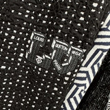 Side profile of Louis Vuitton luxury clothing with everyday silhouette