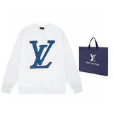 Full styled look of Louis Vuitton luxury clothing with signature branding