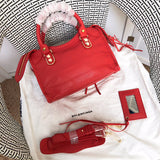 Top view of classic structured women's handbag – women's statement bag