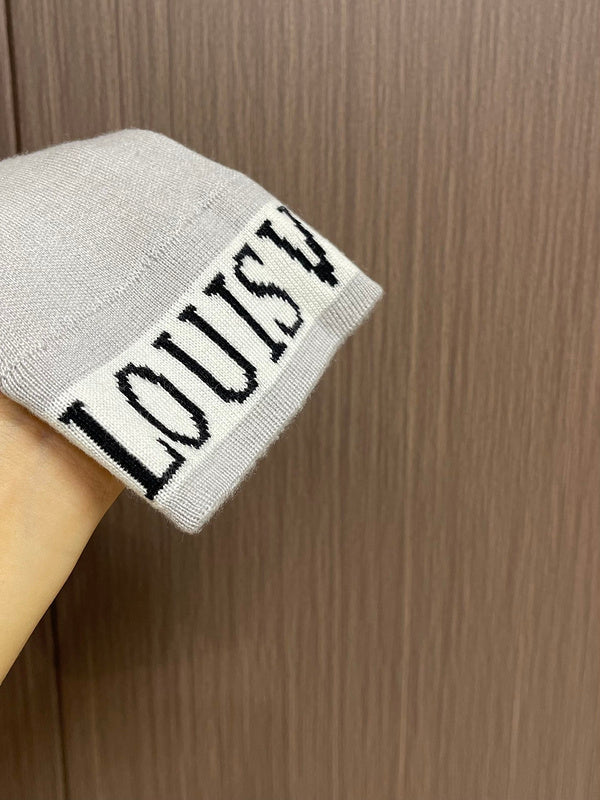 Side profile of Louis Vuitton luxury clothing with signature branding