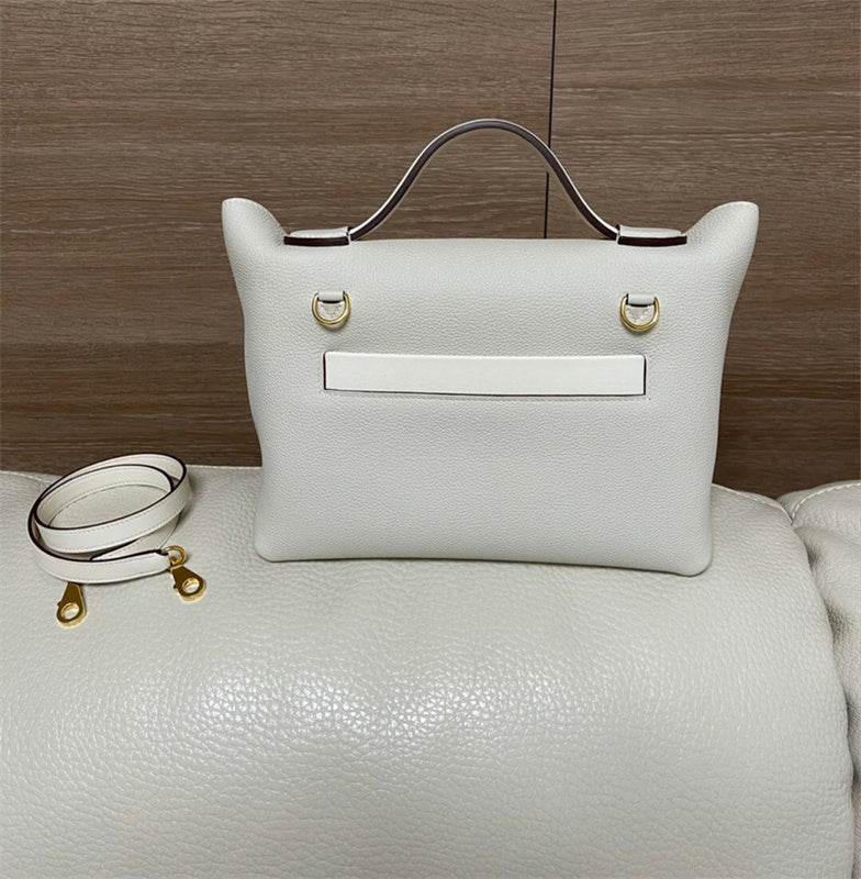 Side view of modern structured handbag