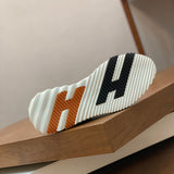 Hermes sandals Style 099 - logo and branding close-up