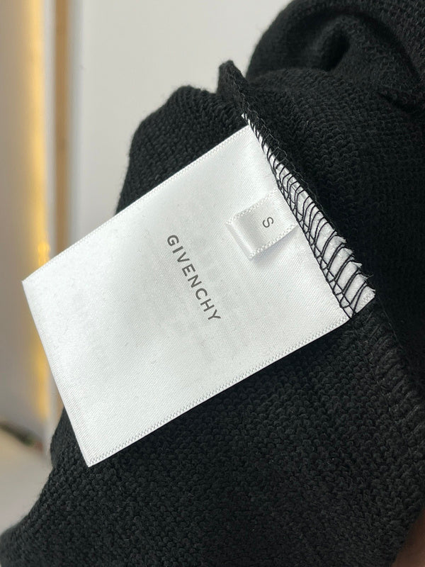 Side profile of Givenchy luxury clothing with everyday silhouette