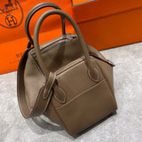 Side view of sleek structured handbag