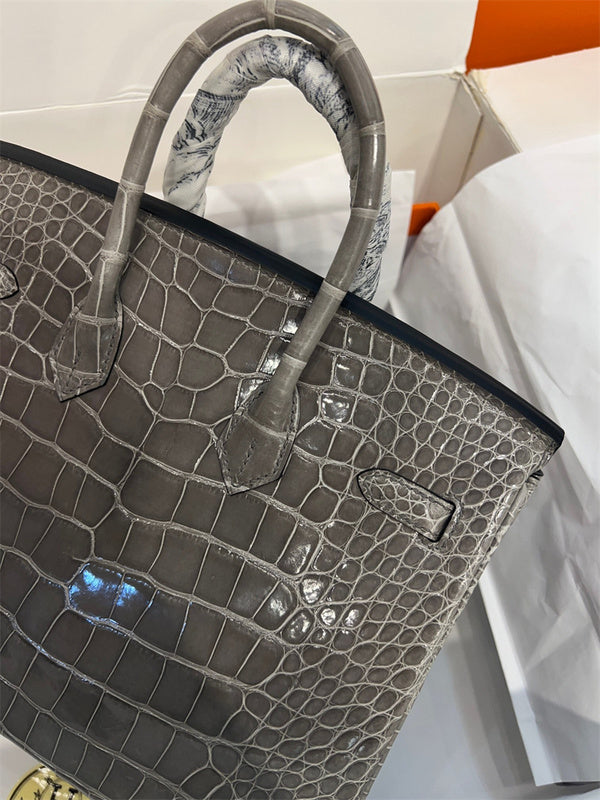 Side view of considered structured handbag