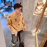 Side profile of Louis Vuitton luxury clothing with signature branding