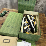 Gucci classic monochrome luxury sneakers view 9 retro runner design