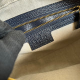 Close-up detail of understated bag design