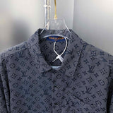 Close-up detail shot of Louis Vuitton luxury clothing with label-forward styling
