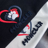 Back view of Moncler luxury clothing with contemporary cut