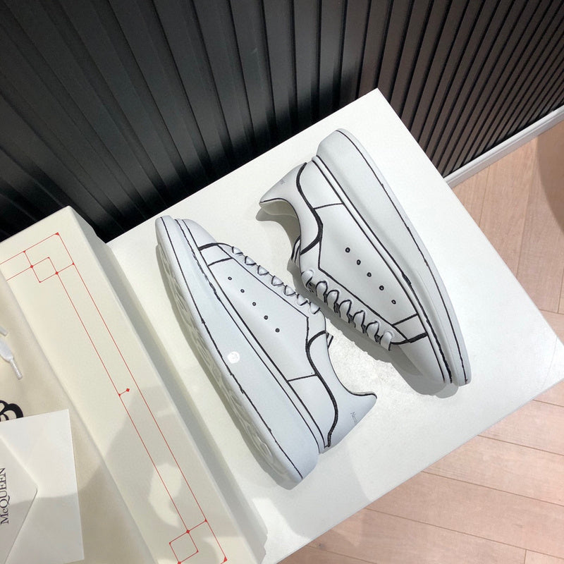 Alexander McQueen soft grey luxury sneakers view 4 chunky sole construction