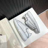 Alexander McQueen soft grey luxury sneakers view 4 chunky sole construction