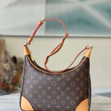 Side profile of refined statement women's handbag – women's luxury accessory